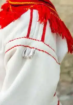 Mustjala naine kasuka ja sarikülliga, 19. saj